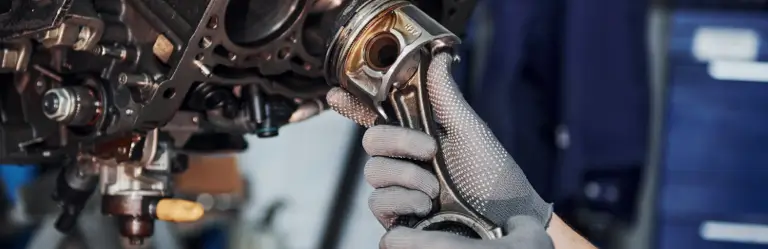 mechanic fitting automotive part