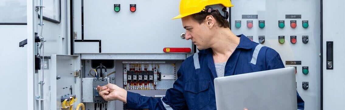 Electrical engineer working in control room