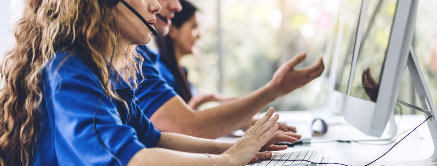 Group of business operators customer support team phone services working with headset